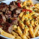 Cajun Steak Tips in Cheesy Penne Parmesan Sauce