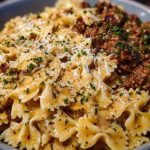 Cheesy Bowtie Pasta with Savory Cajun Ground Beef in Garlic Cream