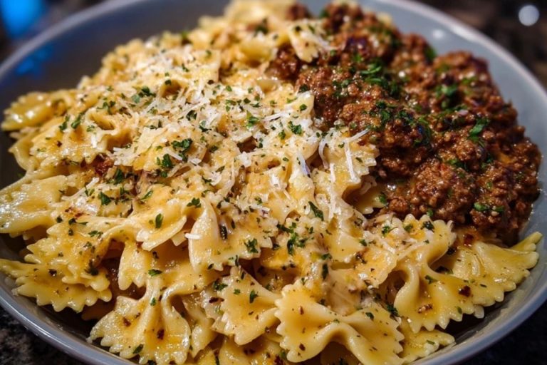 Cheesy Bowtie Pasta with Savory Cajun Ground Beef in Garlic Cream