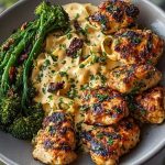 Easy Garlic-Parmesan Chicken Bites Recipe with Sun-Dried Tomato Cajun Alfredo & Charred Broccolini