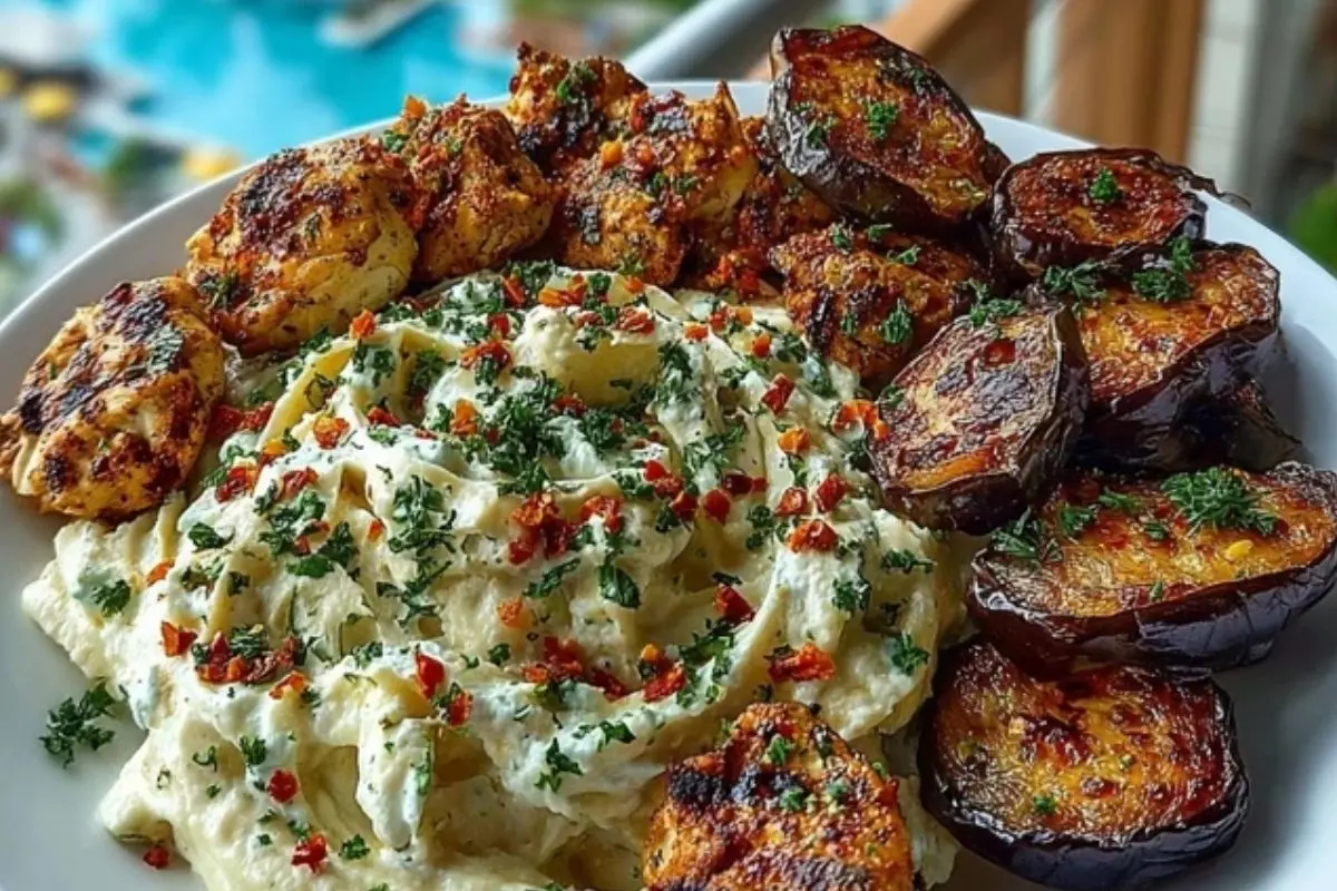 Spicy Whipped Feta Chicken Alfredo with Crispy Eggplant Wedges & Chili Oil Drizzle 1
