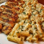 Spicy Cajun Chicken Rigatoni in Creamy Mozzarella Alfredo