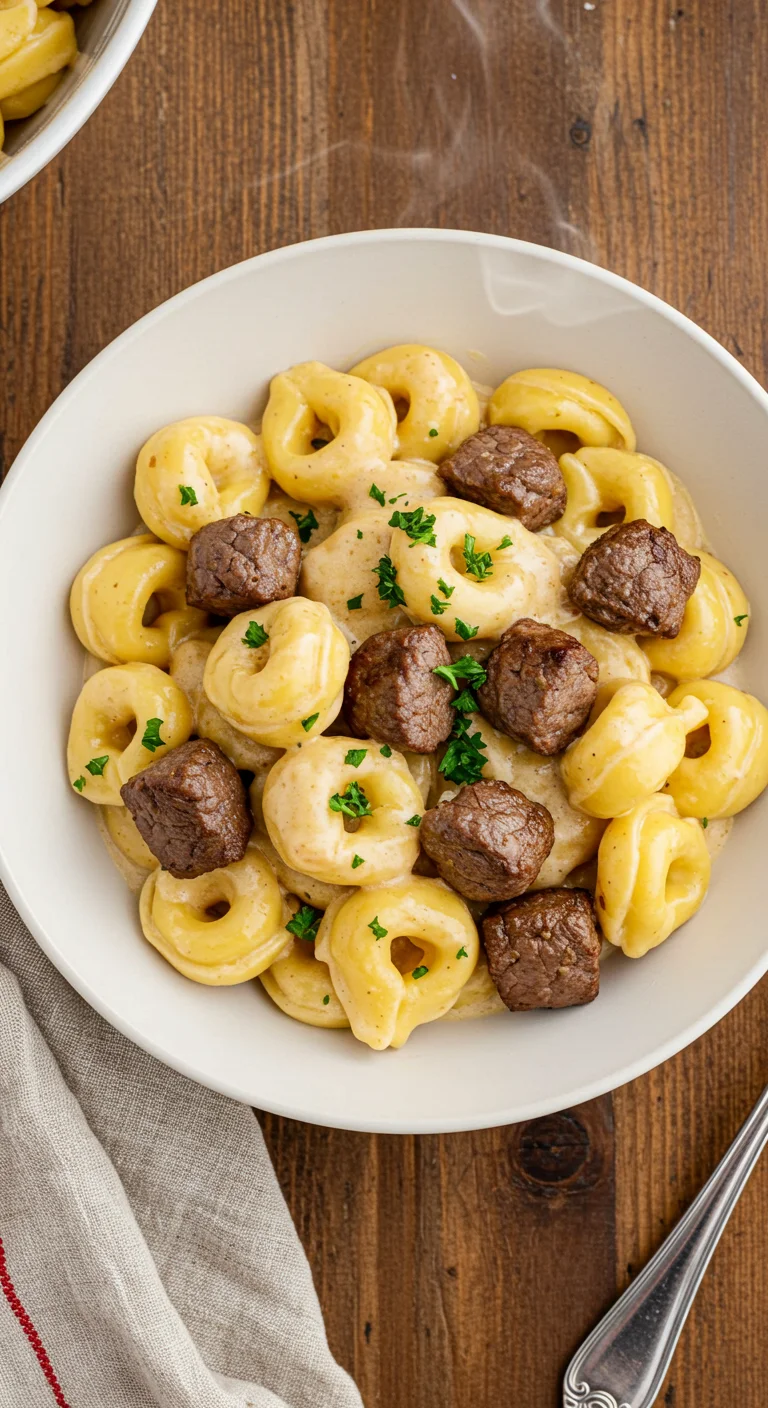 Smothered Steak Bites in Creamy Velveeta Tortellini